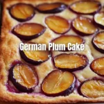Delicious slice of German Plum Cake topped with fresh plums