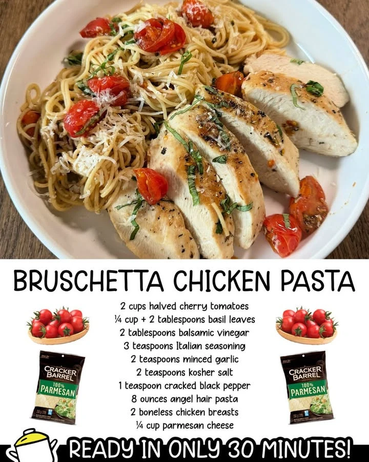 Plate of Bruschetta Chicken Pasta garnished with basil and parmesan cheese
