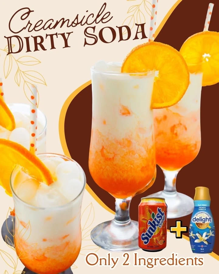 Creamsicle Dirty Soda beverage featuring orange and cream flavors in a glass