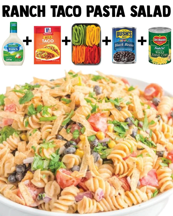 Creamy ranch taco pasta salad in a colorful bowl garnished with fresh herbs