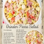 Colorful Grinder Pasta Salad with vegetables and dressing in a bowl.