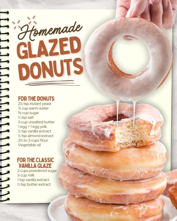 Freshly made homemade glazed donuts on a cooling rack