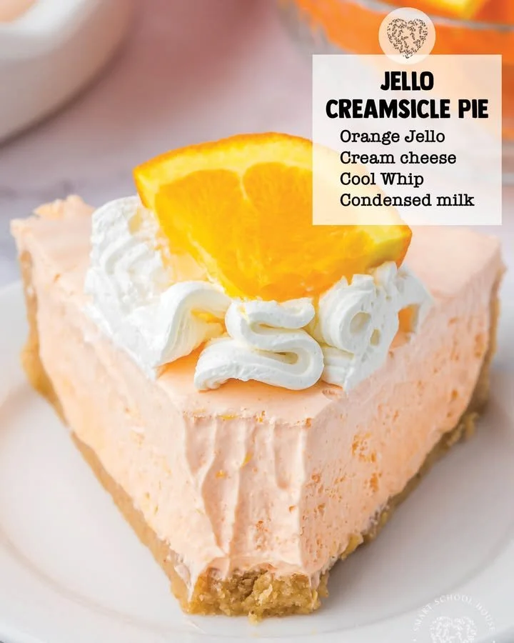 Delicious slice of Orange Jello Creamsicle Pie with whipped topping