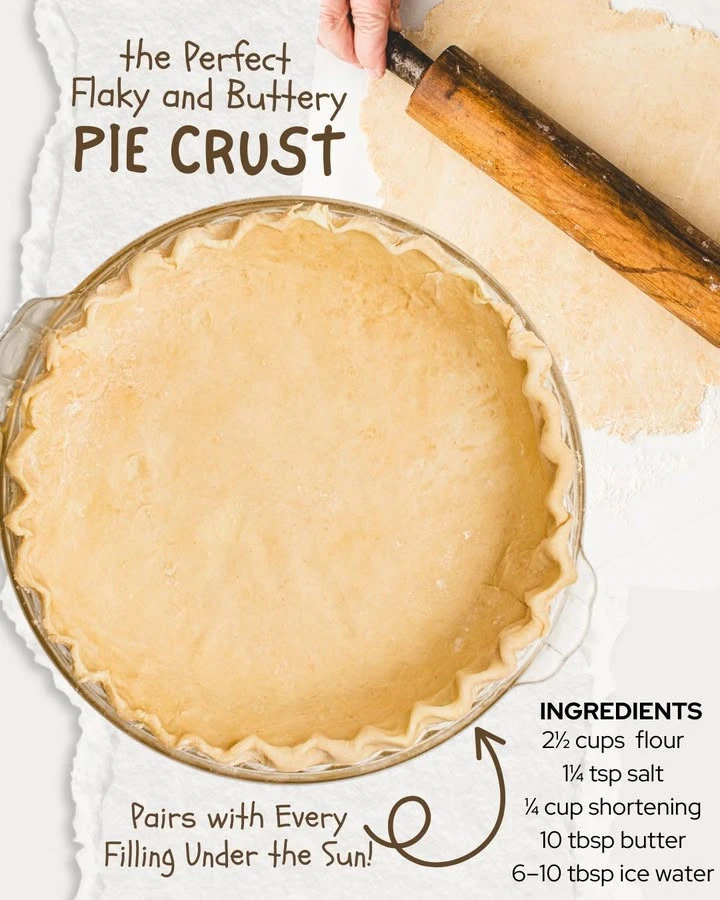 Homemade pie crust ready for baking with a rolling pin and flour.