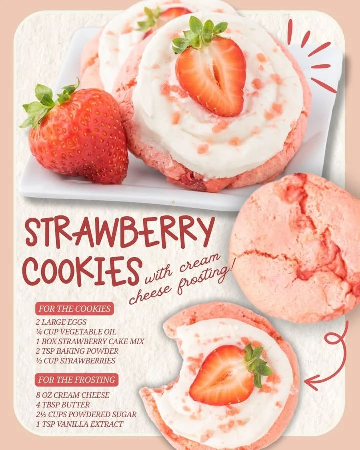 Strawberry cookies topped with cream cheese frosting on a white plate