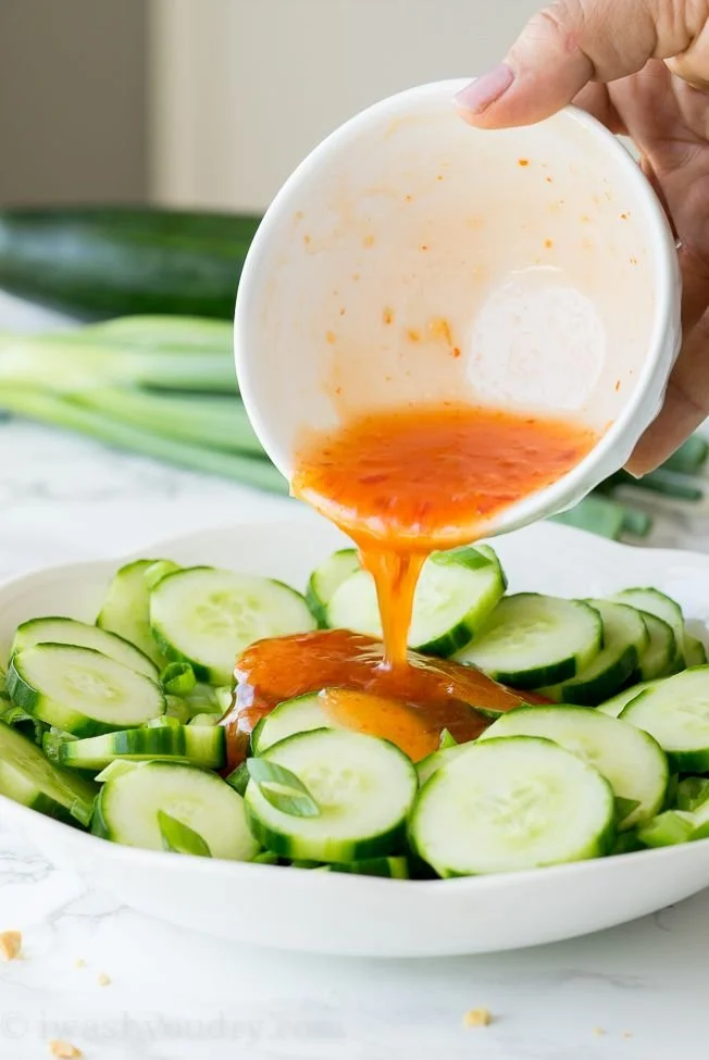 Fresh Thai cucumber salad with vibrant vegetables and herbs