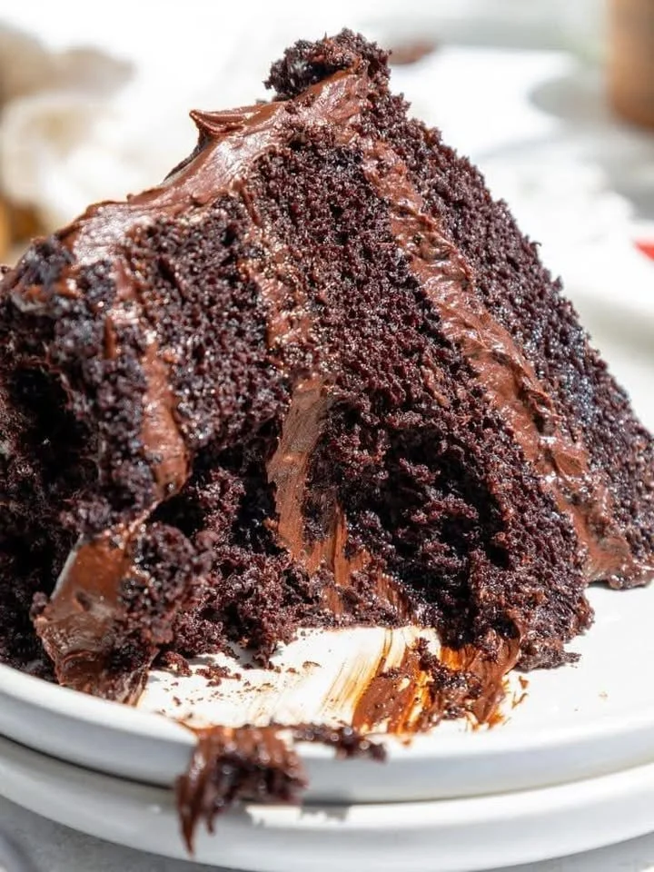 Homemade Dirty Dark Chocolate Cake with rich chocolate icing and decorations