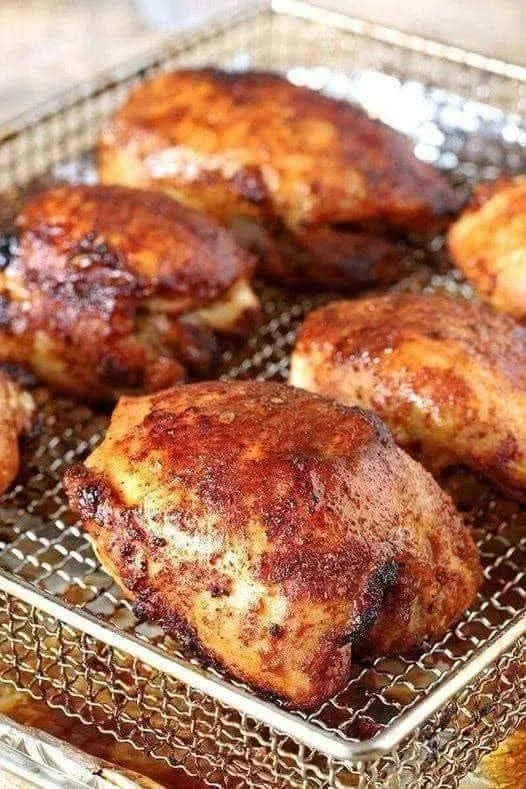 Delicious air fryer boneless thighs served with vegetables