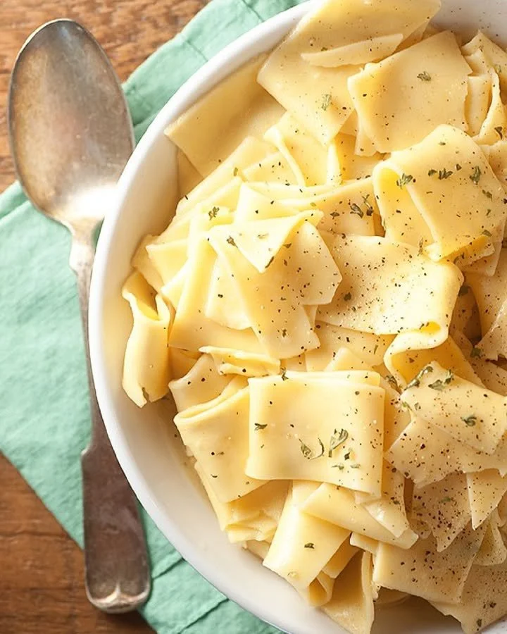 A bowl of delicious Amish Egg Noodles, showcasing their texture and flavor.