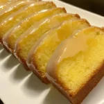 Deliciously baked lemon pound cake garnished with fresh lemon slices