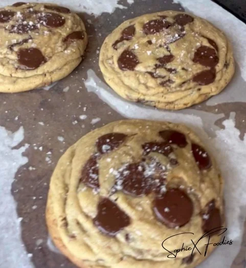 Bakery style chocolate chip cookies freshly baked with gooey chocolate chips