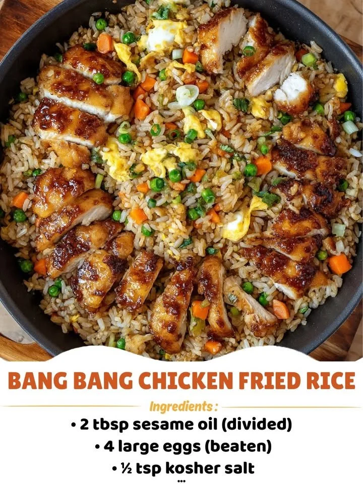 Delicious serving of Bang Bang Chicken Fried Rice garnished with herbs
