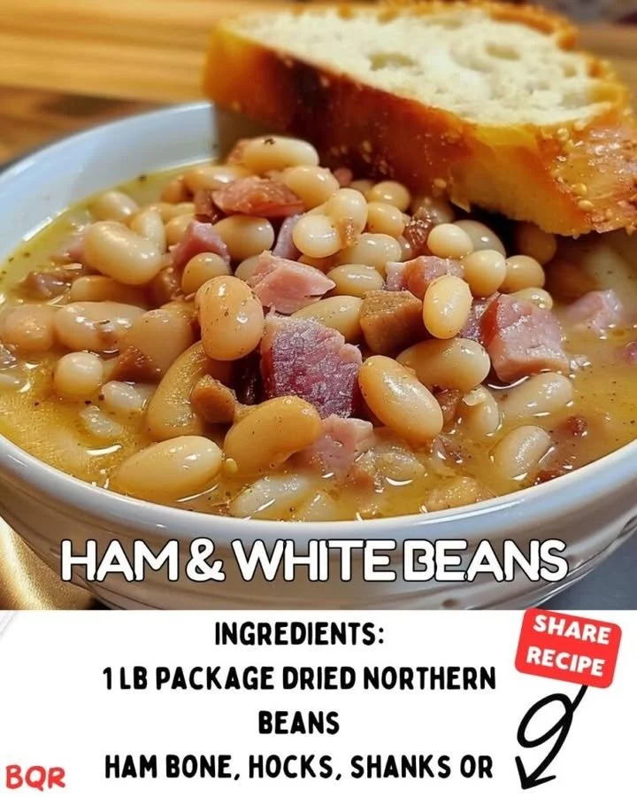 A bowl of savory Bean and Ham Hock Soup garnished with herbs.