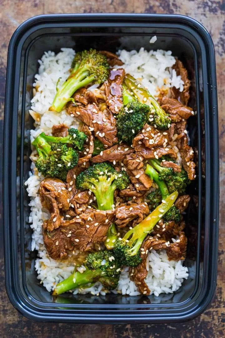 Plate of beef and broccoli stir-fry with rice in a colorful presentation