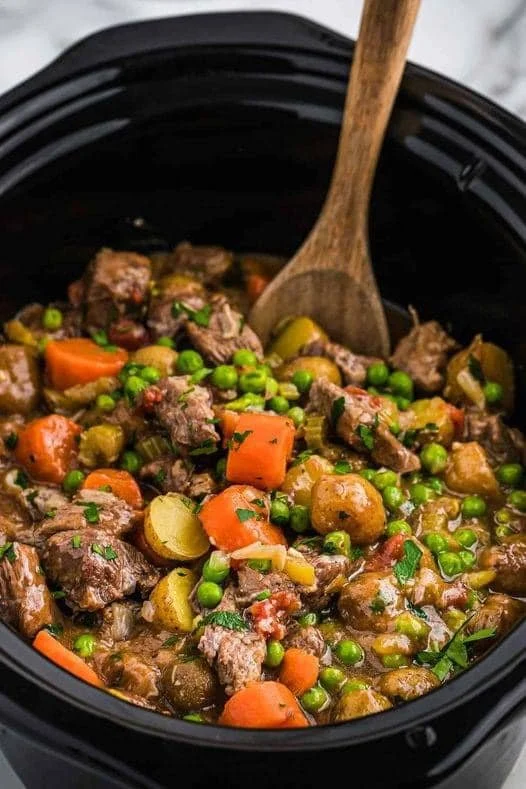 Delicious beef stew made in a slow cooker with vegetables and spices