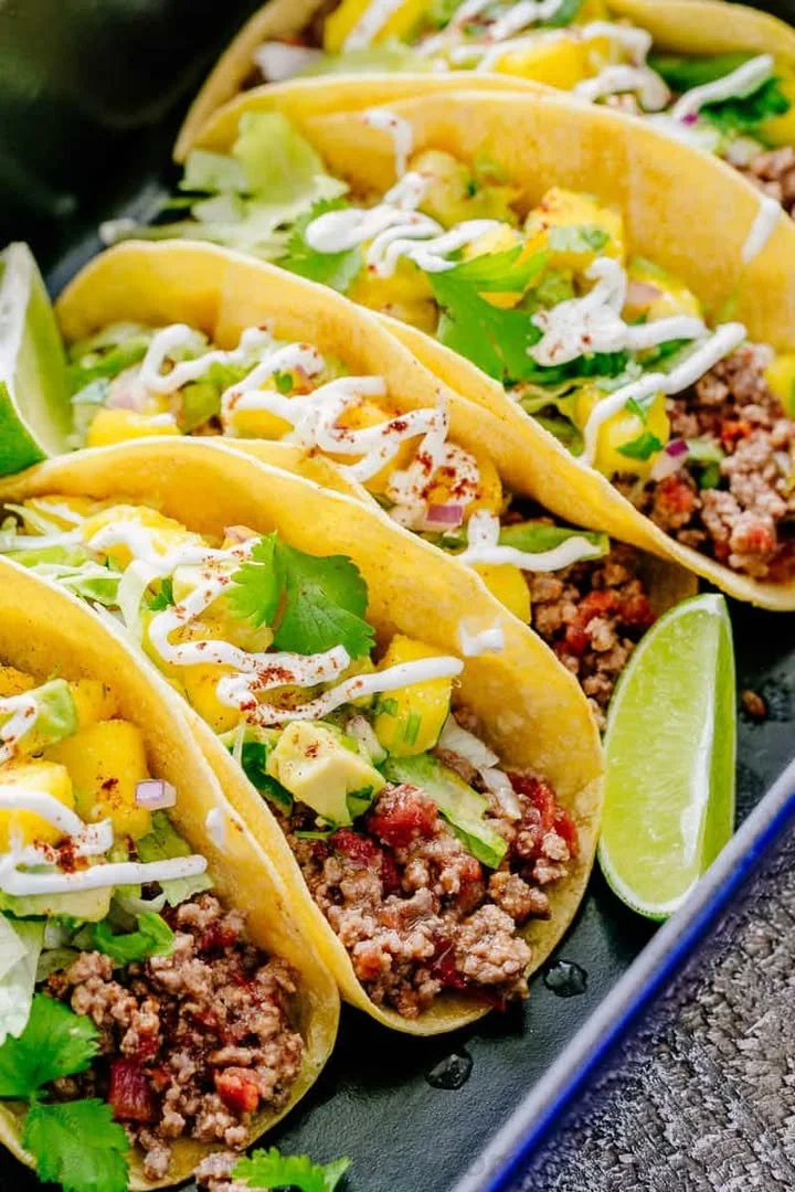 A mouthwatering beef taco loaded with fresh ingredients and spices.