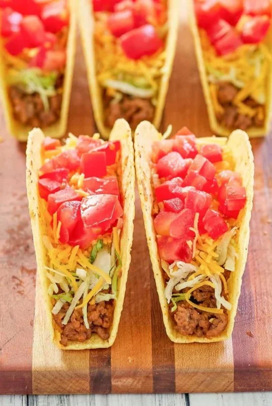 Delicious beef tacos served with fresh toppings and salsa