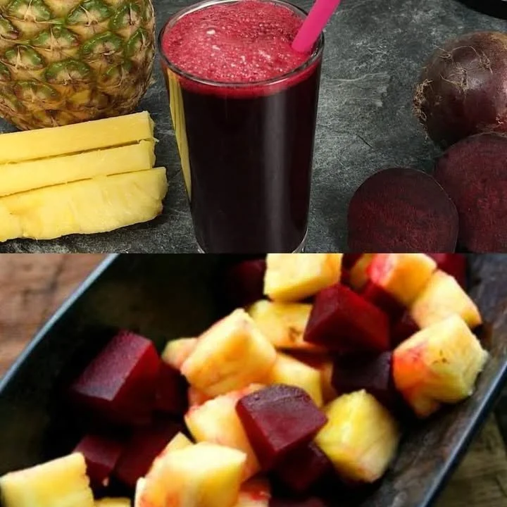 A glass of beetroot pineapple juice garnished with fresh beetroot and pineapple slices