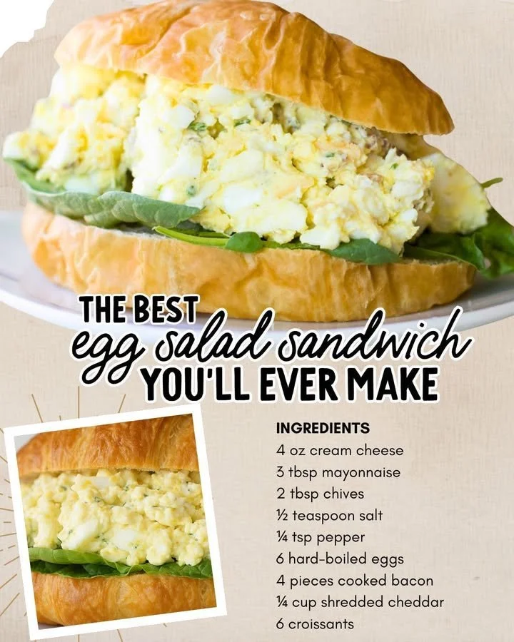 Delicious egg salad sandwich on a plate with fresh ingredients