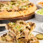 Delicious Big Mac Pizza loaded with toppings and cheese, perfect for burger lovers.