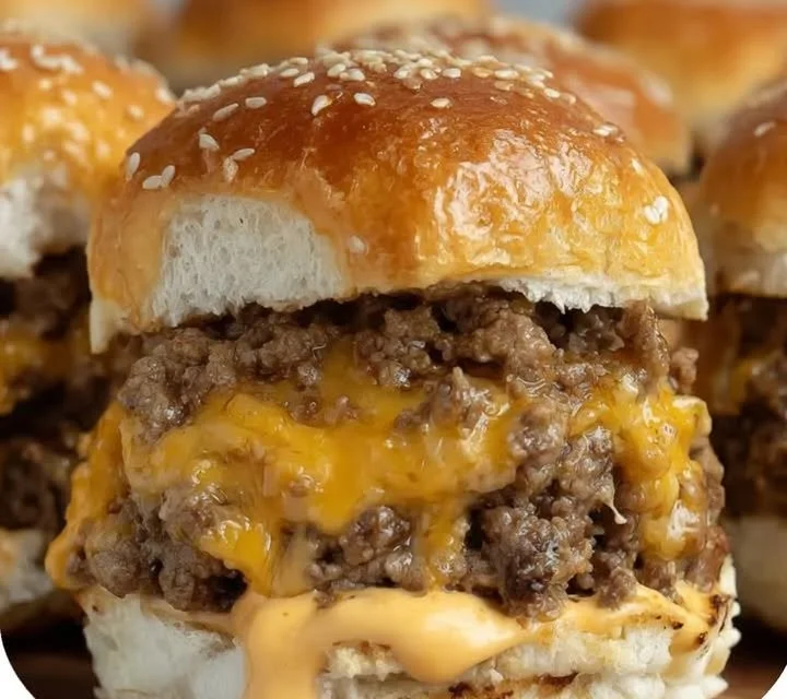 Delicious cheesy ground beef sliders served on a plate