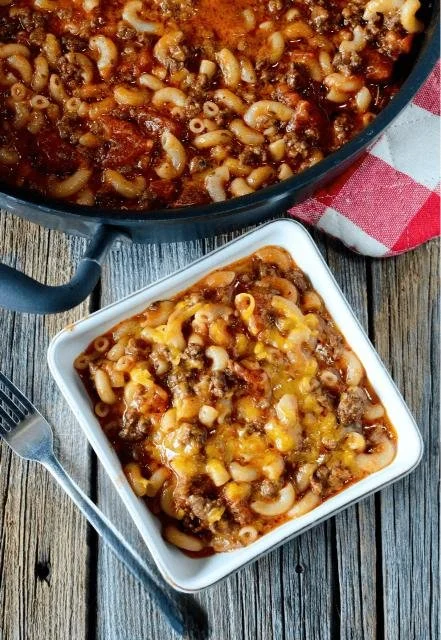 Delicious cheesy old fashioned goulash served in a bowl