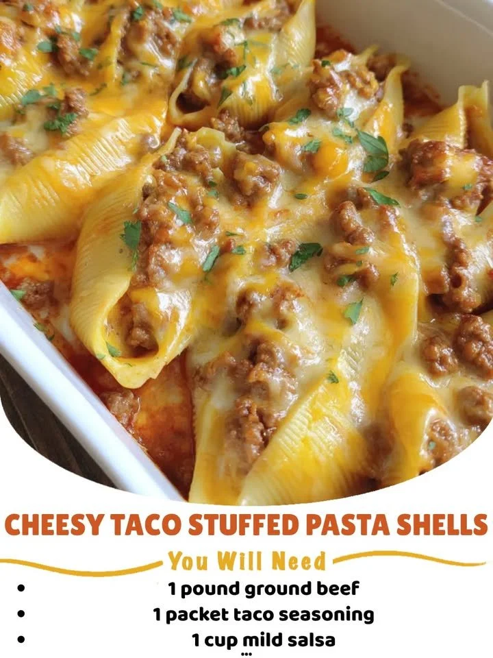 Cheesy taco stuffed pasta shells filled with beef and cheese on a plate.