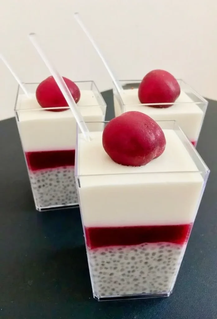 Delicious Cherry Vanilla Chia Cups topped with fresh cherries