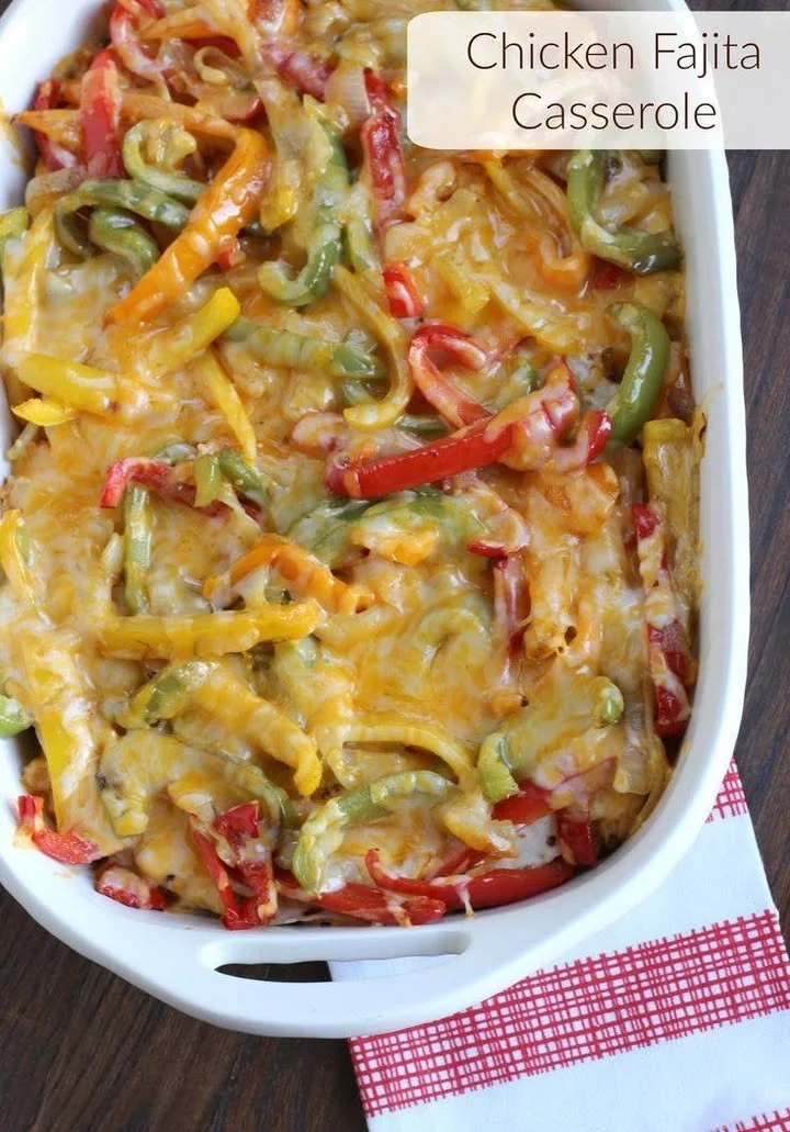 Delicious Chicken Fajita Casserole topped with cheese and colorful veggies
