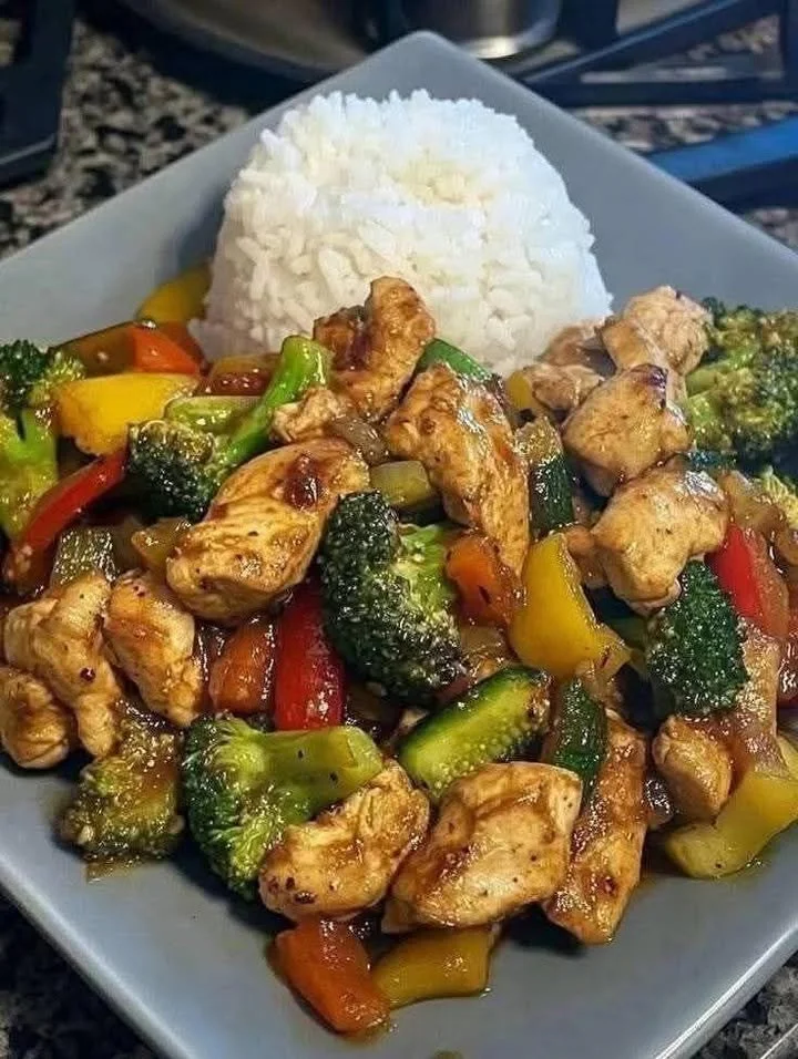 Healthy Chicken Veggie Stir-Fry with Rice in a colorful bowl
