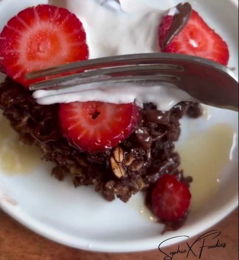 Delicious Chocolate Baked Oatmeal topped with fruits and nuts