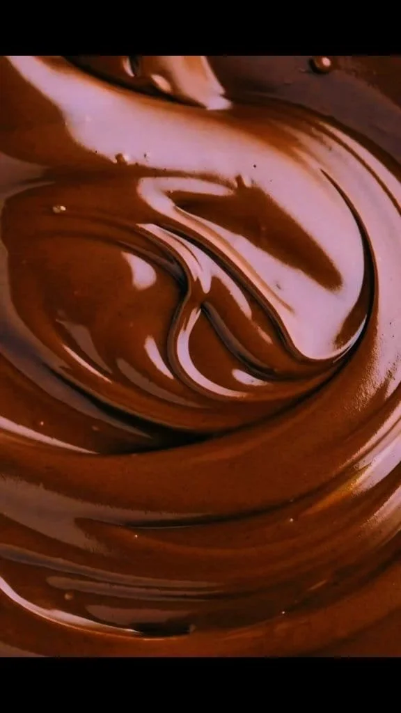 Decadent Chocolate Ganache drizzled over a dessert