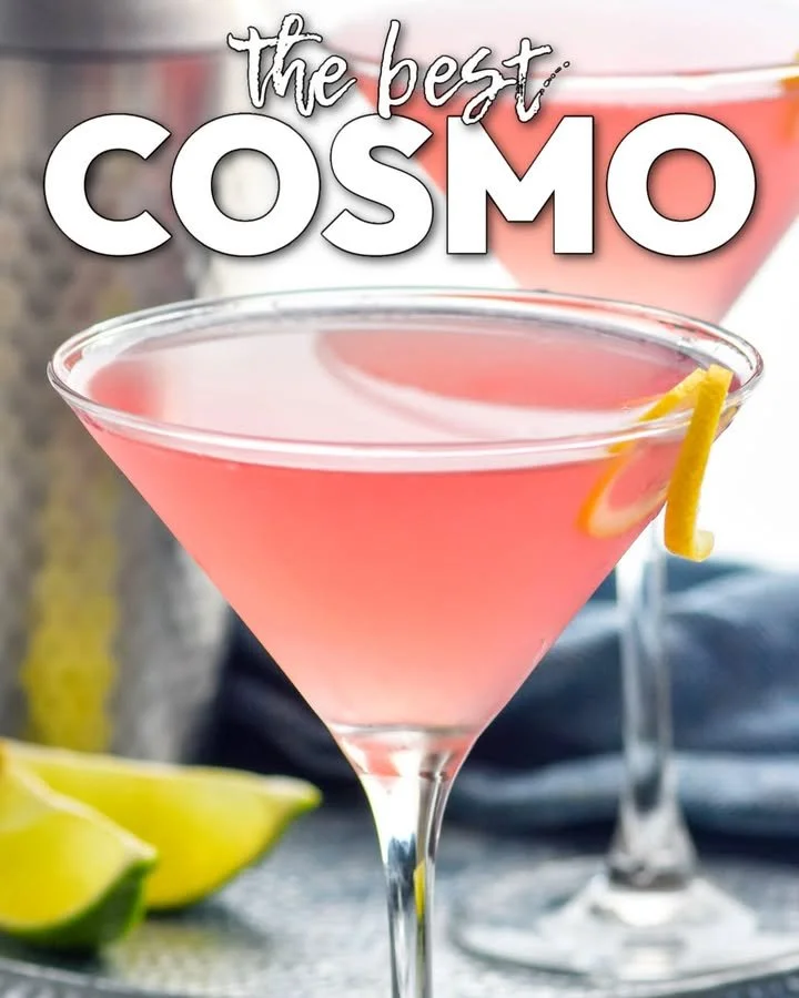 A vibrant cocktail garnished with fresh fruit and herbs, showcasing mixology creativity.
