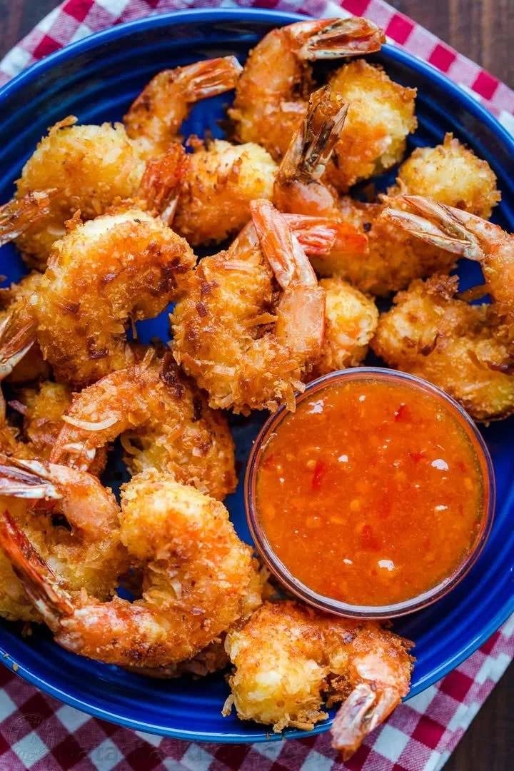 Deliciously crispy Coconut Shrimp served with dipping sauce.