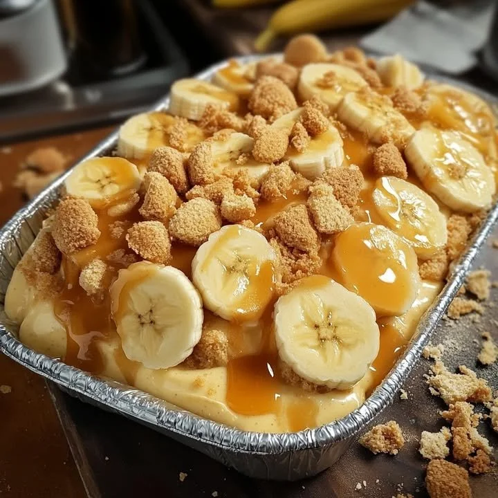 Creamy banana pudding pan dessert with layers of banana and custard
