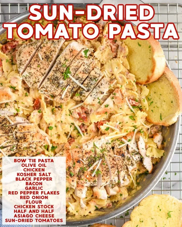 Creamy chicken dish topped with herbs and served on a white plate.