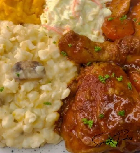 Creamy mushroom samp served with chicken stew and delicious sides.