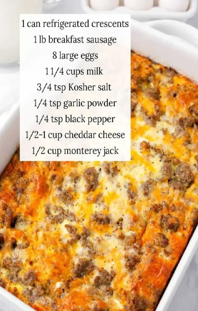 Delicious Crescent Roll Breakfast Casserole topped with cheese and herbs.