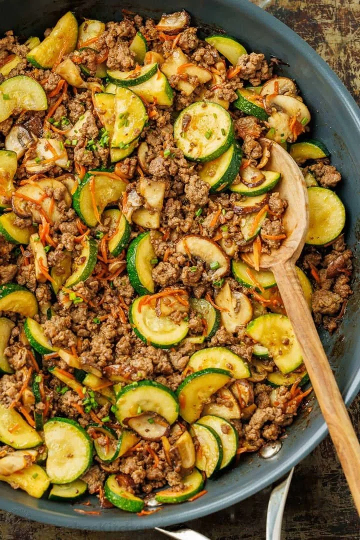 A colorful plate of easy ground beef stir fry with vegetables