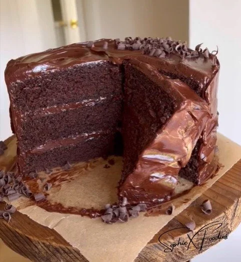 Extra fudgy chocolate cake topped with decadent chocolate frosting