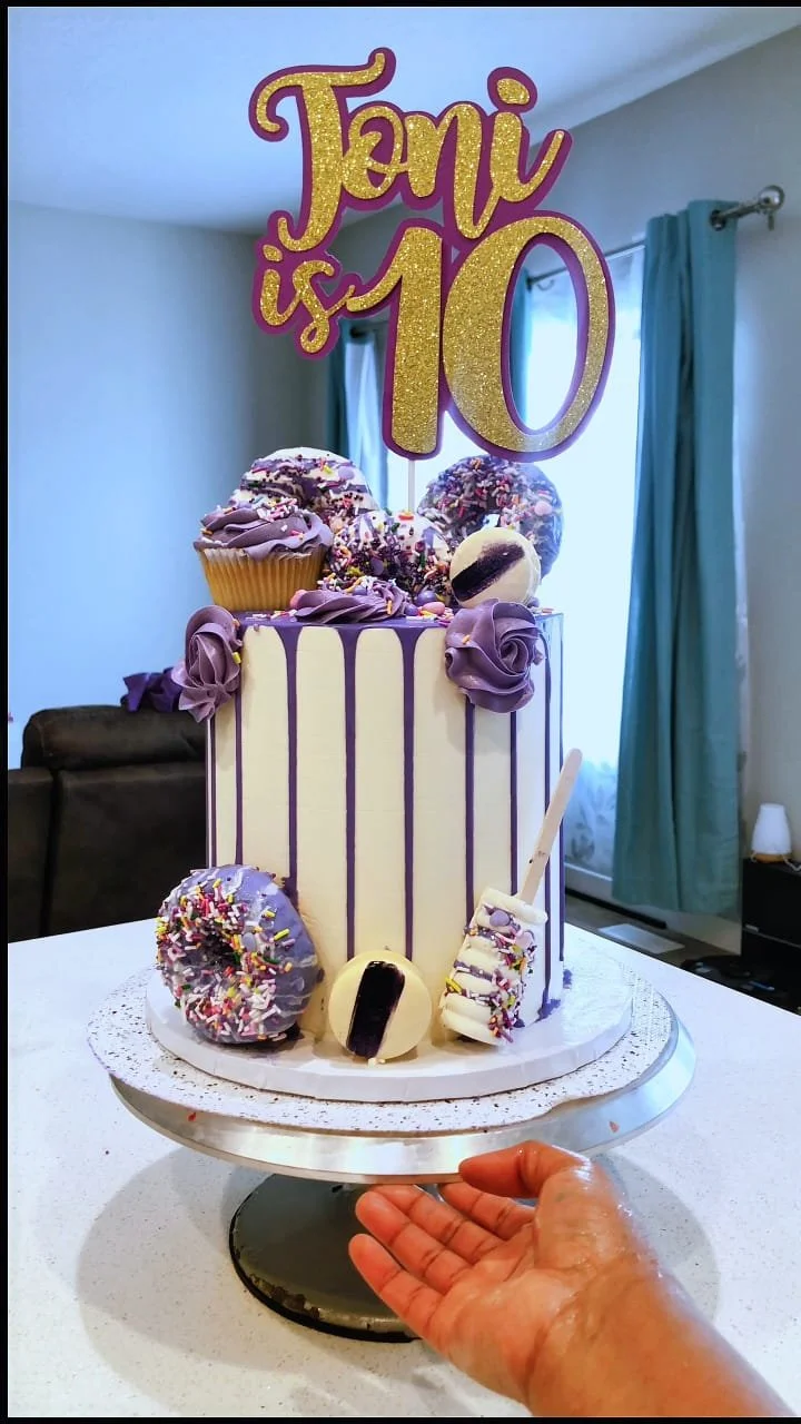 A vibrant Fun Sprinkle Cake topped with colorful sprinkles, perfect for celebrations.