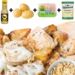 Garlic Parmesan Chicken Skillet dish with creamy sauce and herbs served in a cast-iron pan.