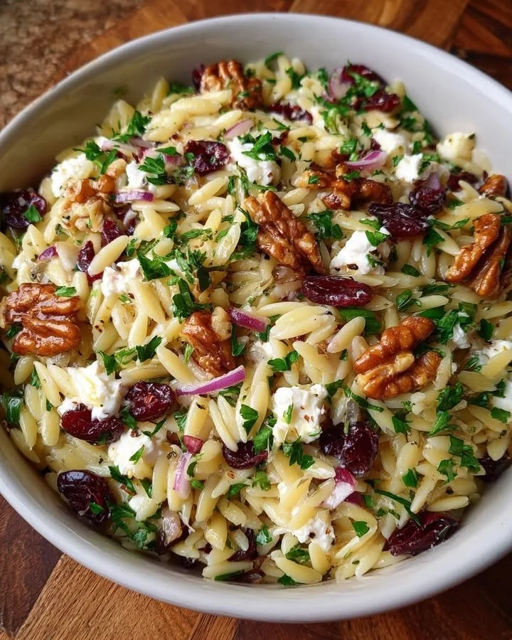 Goat Cheese & Cranberry Orzo Salad with Lemon Vinaigrette in a bowl