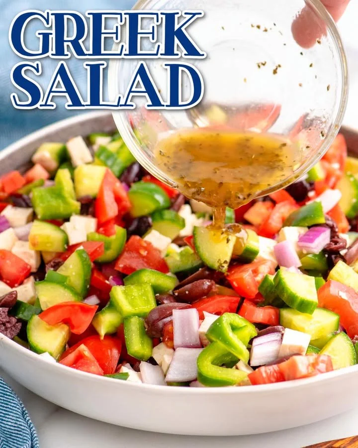 Fresh Greek Salad with tomatoes, cucumbers, feta cheese, and olives