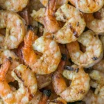 Delicious grilled shrimp skewers ready to be served at a summer barbecue.