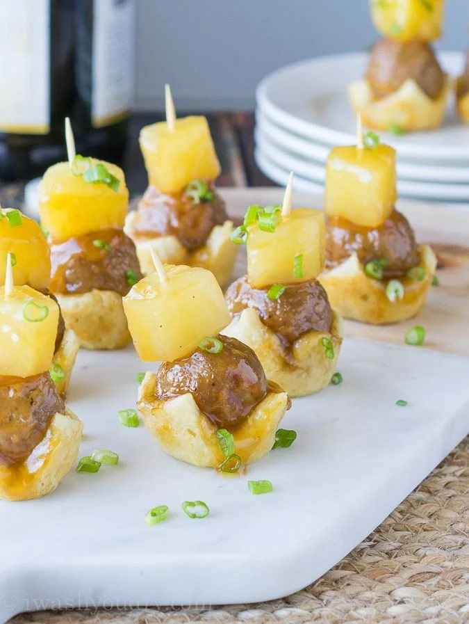 Hawaiian Burger Bites with grilled pineapple and fresh toppings on a plate