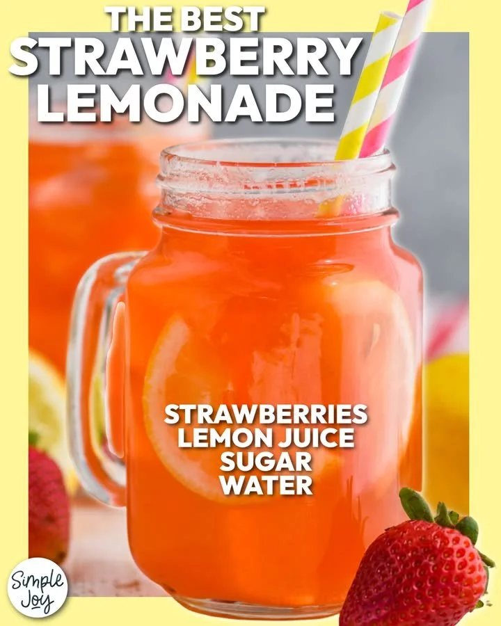 Glass of homemade strawberry lemonade with fresh strawberries and lemon slices