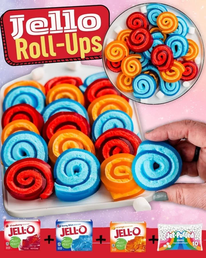 Colorful Jello Roll Ups rolled with fruit and filling, perfect for snacks and parties.