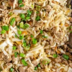 Keto Egg Roll in a Bowl with fresh vegetables and protein topping