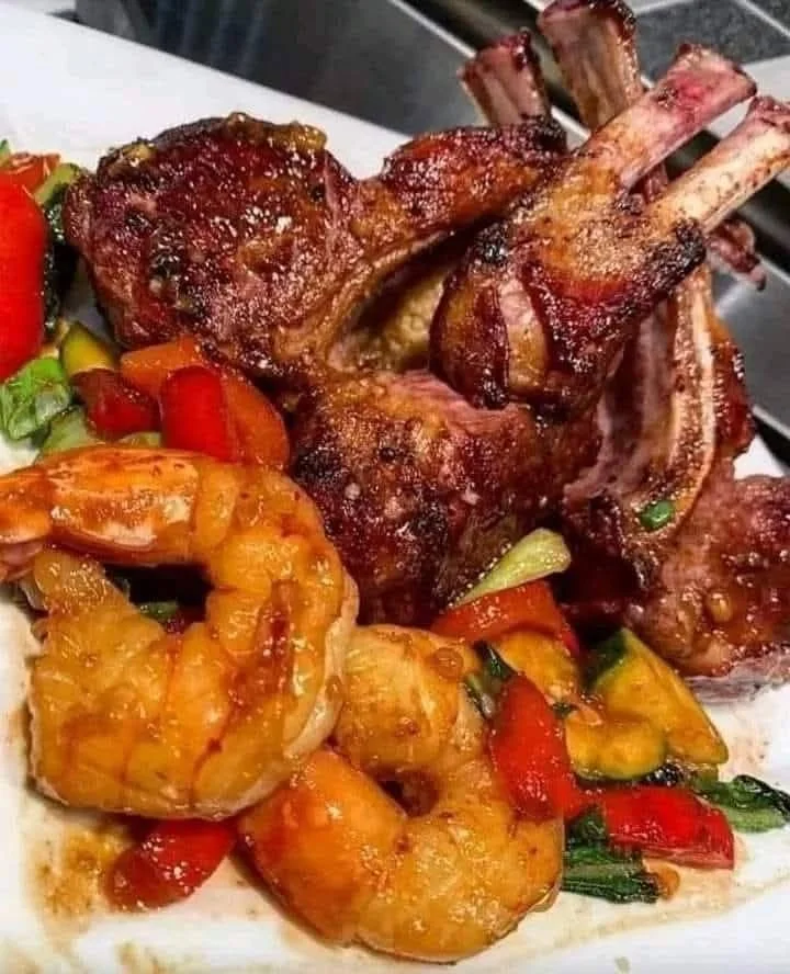 Juicy lamb chops served over creamy lobster mash with tender asparagus.